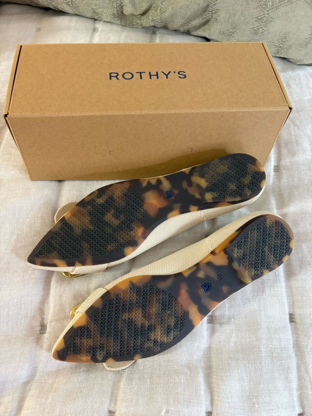 Rothy's The Emblem Point II - Women's Cream Pointed-Toe Flats with Gold Buckle - Picture 2 of 3